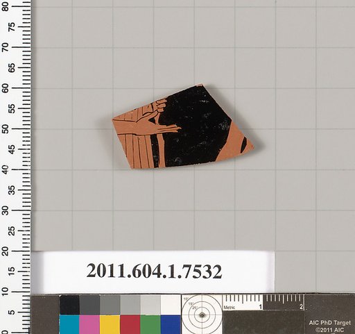 Terracotta fragment of a kylix (drinking cup)
