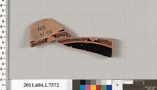 Terracotta fragment of a kylix (drinking cup)