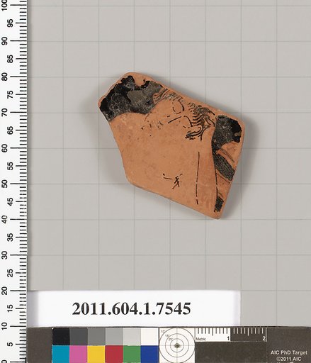 Terracotta fragment of a kylix (drinking cup)