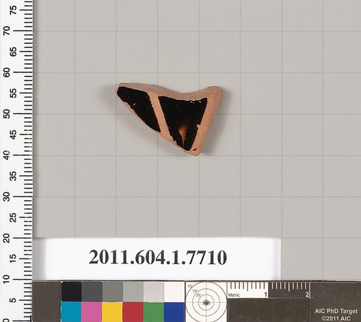 Terracotta fragment of a kylix (drinking cup)