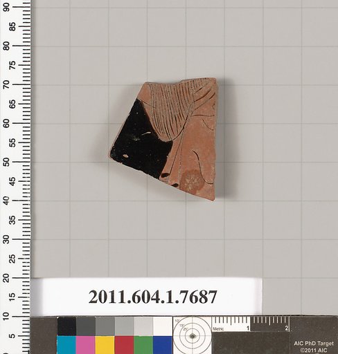 Terracotta fragment of a kylix (drinking cup)