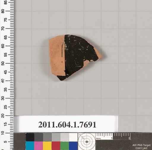Terracotta fragment of a kylix (drinking cup)