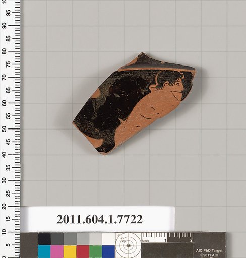Terracotta fragment of a kylix (drinking cup)