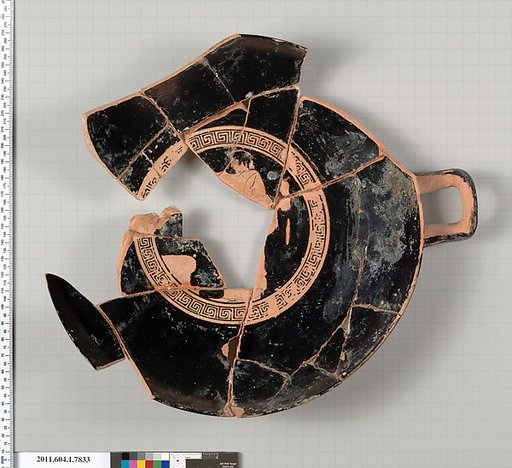Terracotta fragment of a kylix (drinking cup)