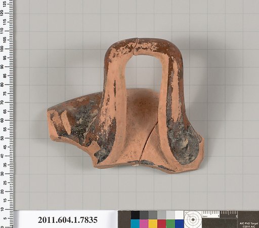 Terracotta fragment of a kylix (drinking cup)