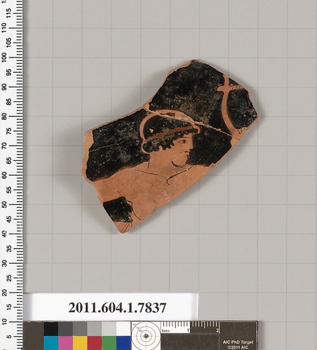 Terracotta fragment of a kylix (drinking cup)