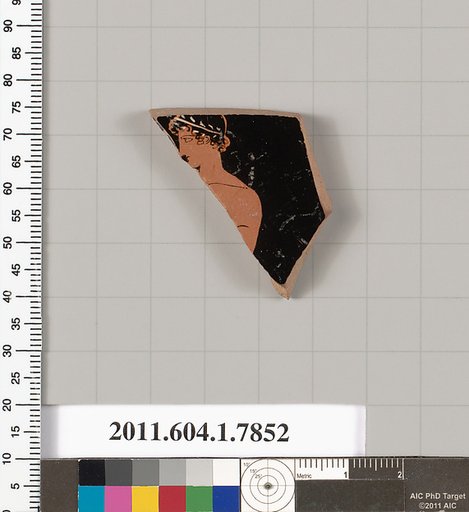 Terracotta fragment of a kylix (drinking cup)