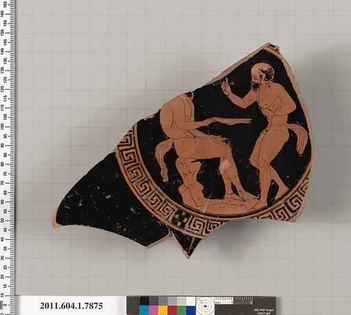 Terracotta fragment of a kylix (drinking cup)
