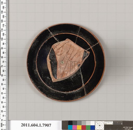 Terracotta fragment of a kylix (drinking cup)