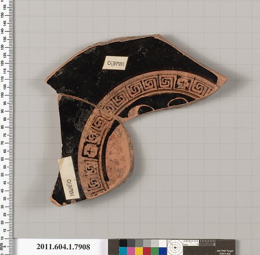 Terracotta fragment of a kylix (drinking cup)