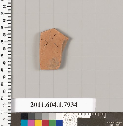 Terracotta fragment of a kylix (drinking cup)
