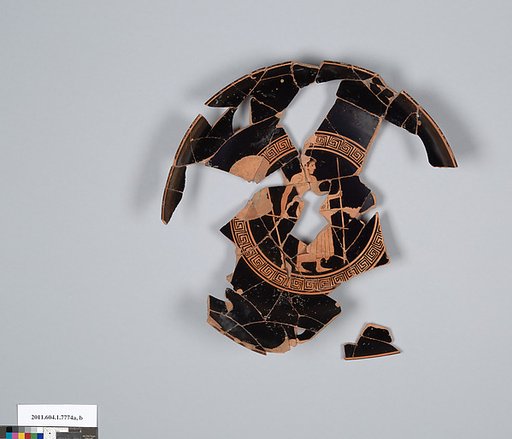 Terracotta fragment of a kylix (drinking cup)