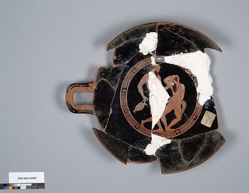 Terracotta fragment of a kylix (drinking cup)