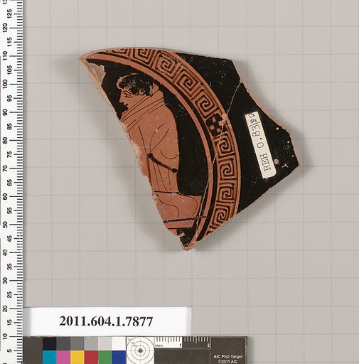 Terracotta fragment of a kylix (drinking cup)