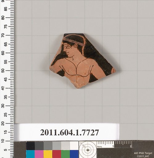 Terracotta rim fragment of a kylix (drinking cup)