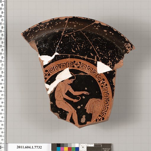 Terracotta fragment of a kylix (drinking cup)