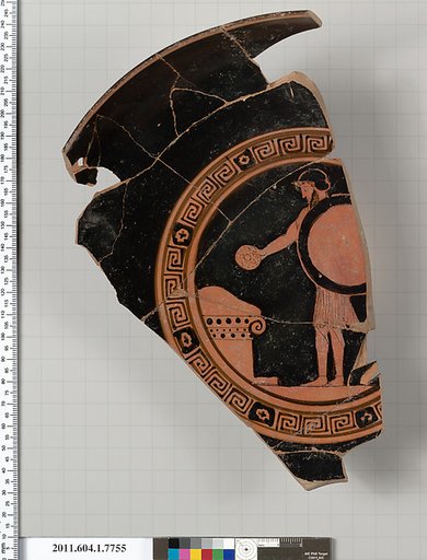 Terracotta fragment of a kylix (drinking cup)