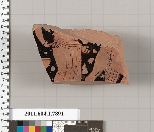 Terracotta fragment of a kylix (drinking cup)