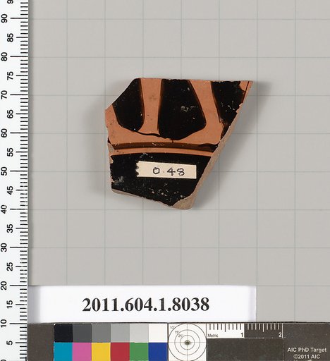 Terracotta fragment of a kylix (drinking cup)