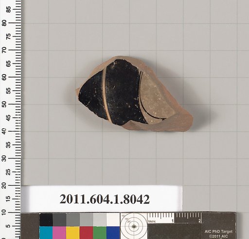Terracotta fragment of a kylix (drinking cup)