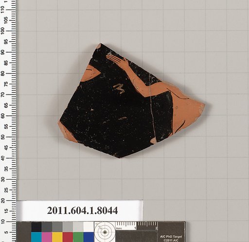 Terracotta fragment of a kylix (drinking cup)