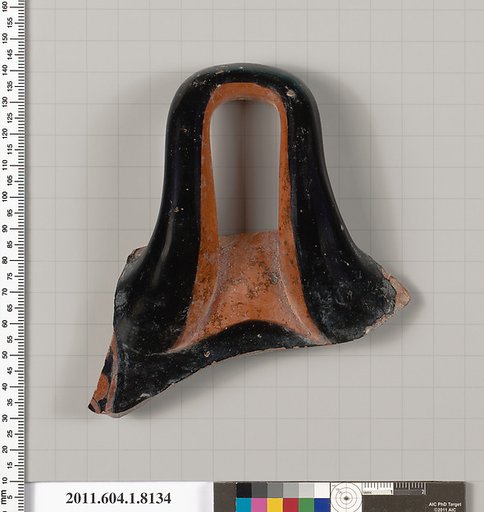 Terracotta fragment of a kylix (drinking cup)