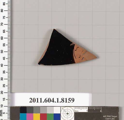 Terracotta fragment of a kylix (drinking cup)