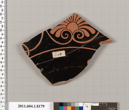 Terracotta fragment of a kylix (drinking cup)