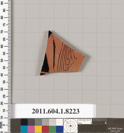 Terracotta fragment of a kylix (drinking cup)