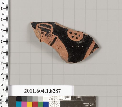 Terracotta rim fragment of a kylix (drinking cup)