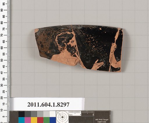 Terracotta rim fragment of a kylix (drinking cup)