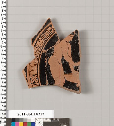 Terracotta fragment of a kylix (drinking cup)