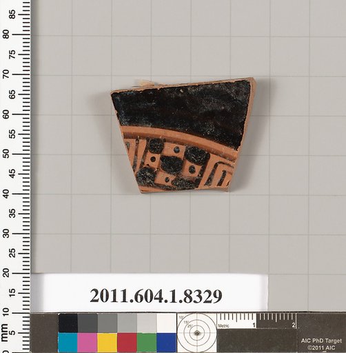 Terracotta fragment of a kylix (drinking cup)