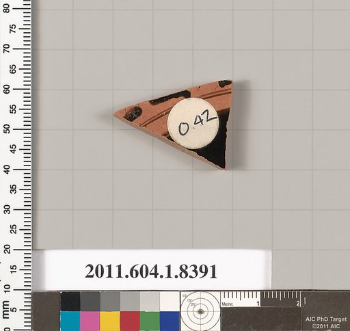 Terracotta fragment of a kylix (drinking cup)