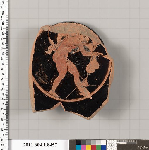 Terracotta fragment of a stemless kylix (drinking cup)