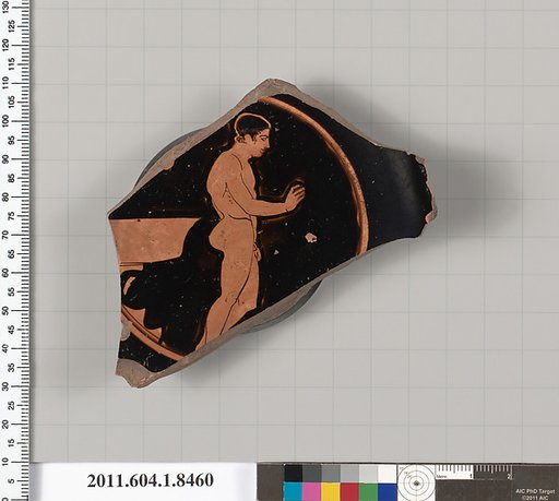 Terracotta fragment of a stemless kylix (drinking cup)