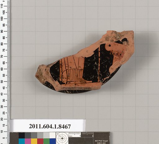 Terracotta fragment of a stemless kylix (drinking cup)