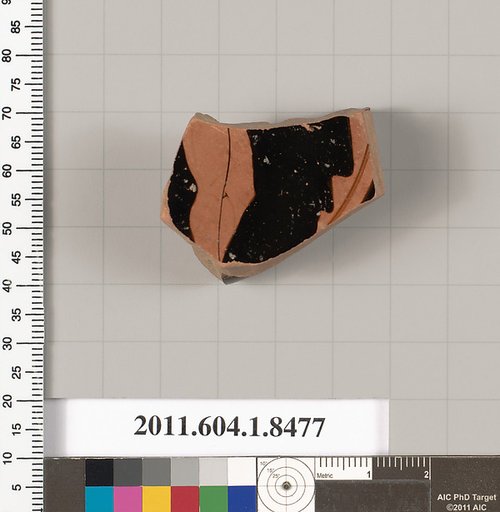 Terracotta fragment of a stemless kylix (drinking cup)