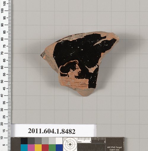 Terracotta fragment of a stemless kylix (drinking cup)