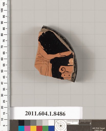 Terracotta fragment of a stemless kylix (drinking cup)