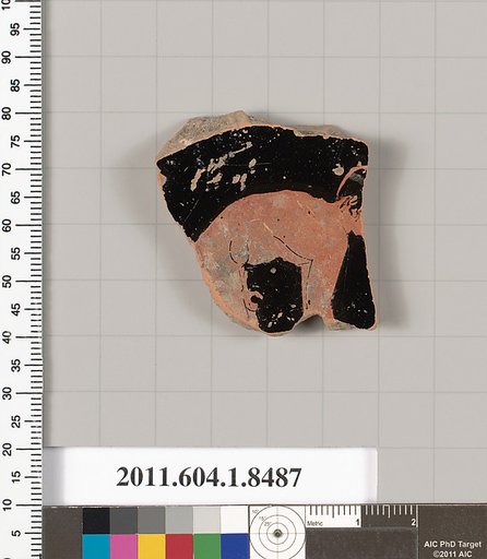 Terracotta fragment of a stemless kylix (drinking cup)
