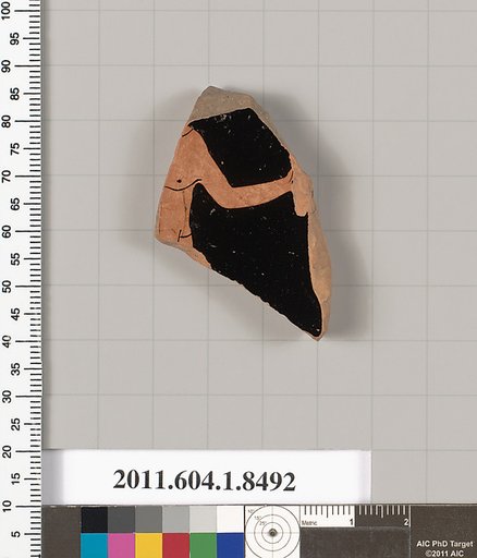 Terracotta fragment of a stemless kylix (drinking cup)
