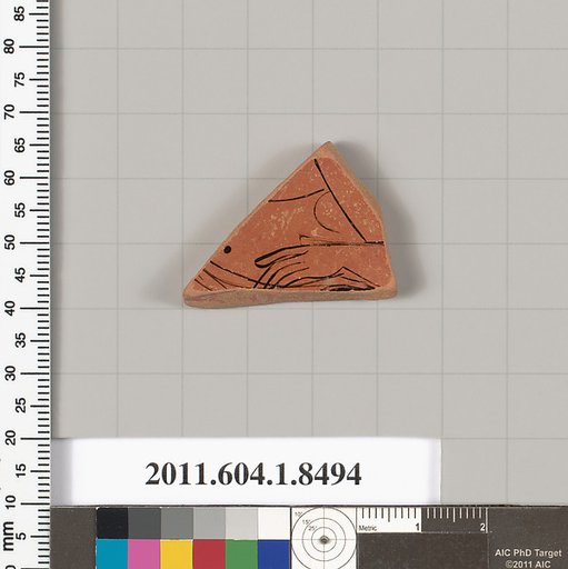 Terracotta fragment of a stemless kylix (drinking cup)
