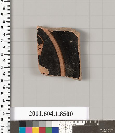 Terracotta fragment of a stemless kylix (drinking cup)