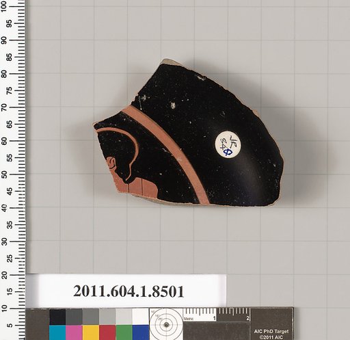 Terracotta fragment of a stemless kylix (drinking cup)