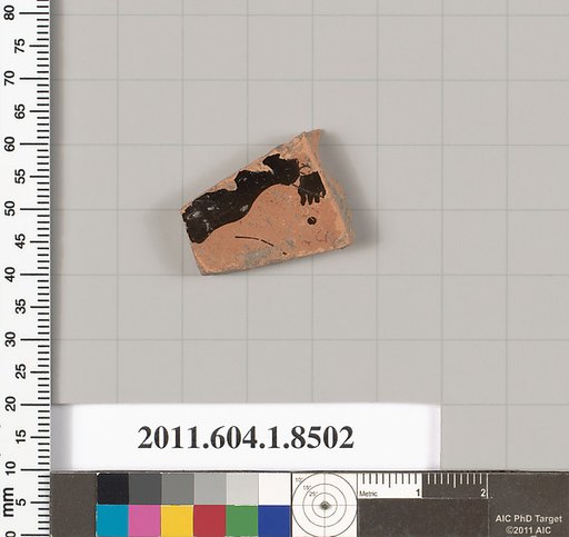 Terracotta fragment of a stemless kylix (drinking cup)