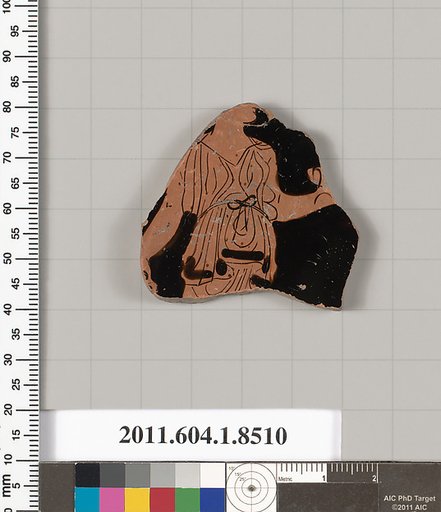 Terracotta fragment of a stemless kylix (drinking cup)