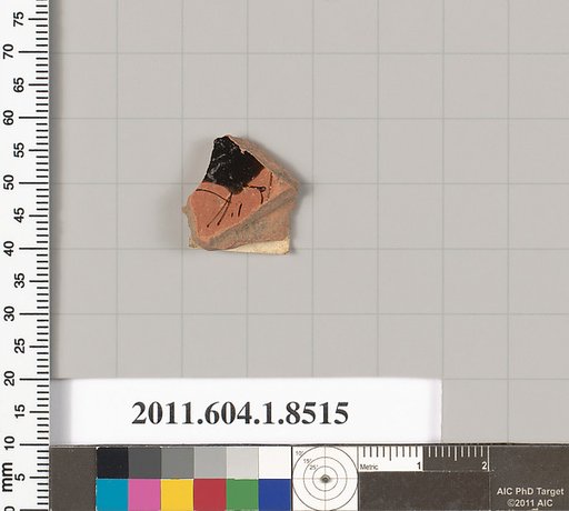 Terracotta fragment of a stemless kylix (drinking cup)