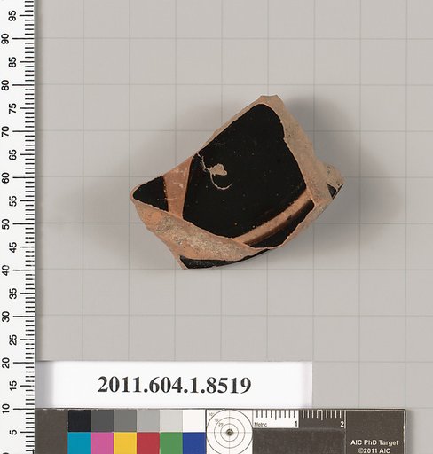 Terracotta fragment of a stemless kylix (drinking cup)
