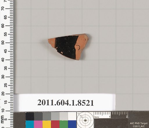 Terracotta fragment of a stemless kylix (drinking cup)